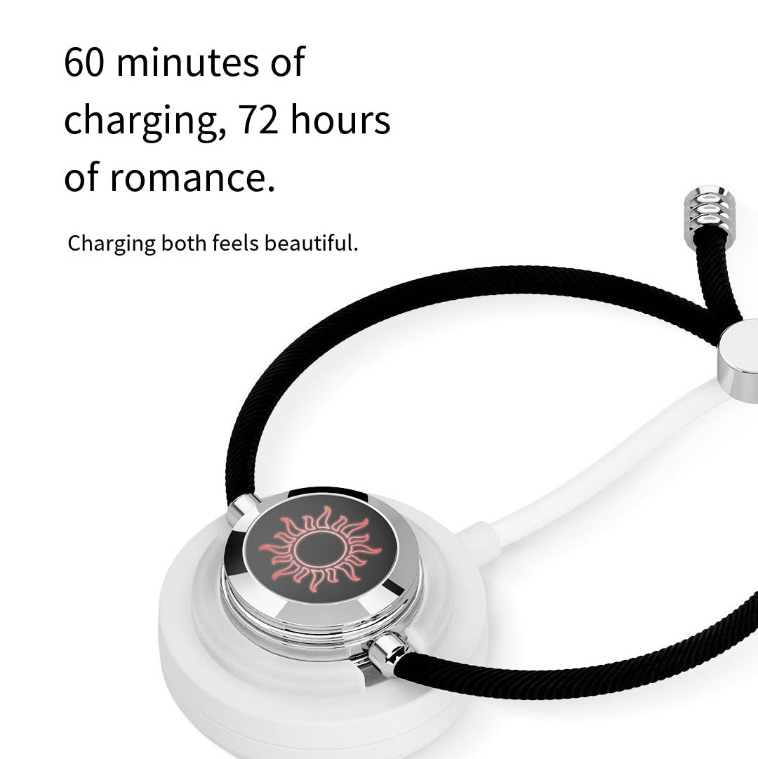 Smartwatch and bracelet with text on technology, art, and romance.